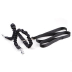 Two-part black dual-lead dog leash with long flat strap and bungee lead on a white background